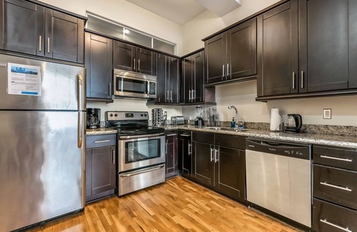 Central Business District Apartment | Merchant Lofts Comfy Condos – Walk Everywhere