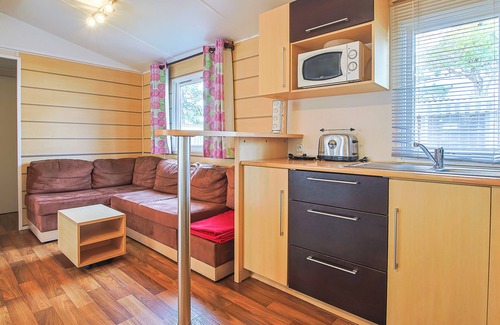 Saint-Jean-de-Monts RV Rental | Mobile Home 'Mobilhome Tout Équipé Bois Masson' with Shared Pool and Shared Terrace