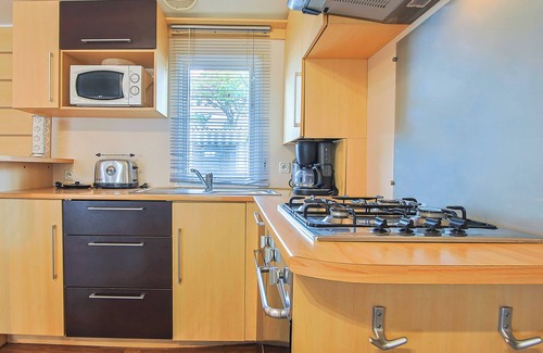 Saint-Jean-de-Monts RV Rental | Mobile Home 'Mobilhome Tout Équipé Bois Masson' with Shared Pool and Shared Terrace