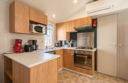 Ronce-les-Bains RV Rental | Mobile Home 'Mh 428 Ronce Les Bains' with Shared Pool, Terrace and Air Conditioning