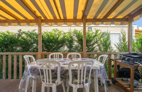 Les Mathes RV Rental | Mobile Home 'Mobil Home La Palmyre 4etoiles' with Private Terrace, Garden and Air Conditioning