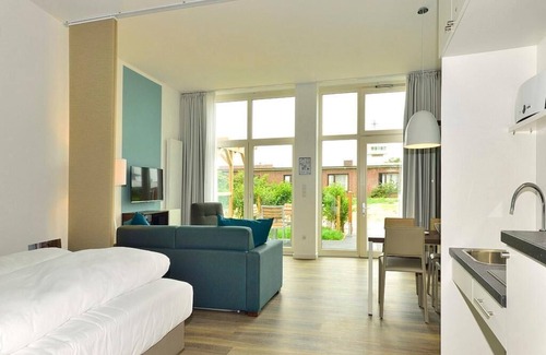 Wangerooge Apartment | Modern, dog-friendly apartment with west-facing terrace - only 20 m to the beach!