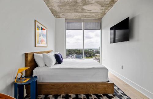 Rainey Street Historic District House | Modern 1BR Condo on Rainey St - Pool & Views