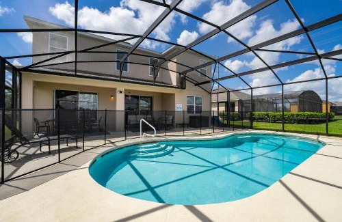 Davenport House | Modern 5BD, 4BA pool home in a golf resort community of Providence