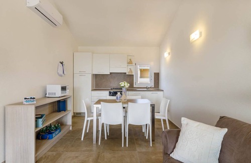 Monte Petrosu Apartment | modern apartment 5 min. from the sea with swimming pool, air conditioning and wi-fi