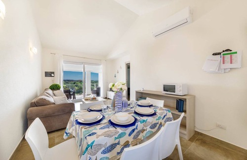 Monte Petrosu Apartment | modern apartment 5 min. from the sea with swimming pool, air conditioning and wi-fi