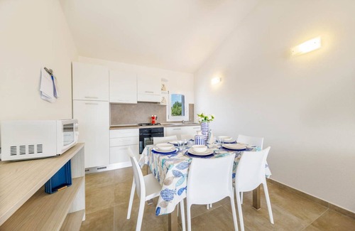 Monte Petrosu Apartment | modern apartment 5 min. from the sea with swimming pool, air conditioning and wi-fi