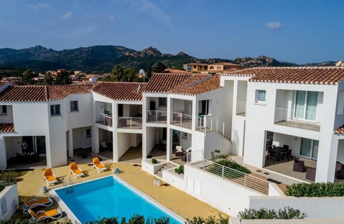 Monte Petrosu Apartment | modern apartment 5 min from the sea with swimming pool, air conditioning and wi-fi