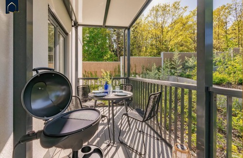 Koelpinsee Apartment | Modern bluefish hut with balcony - only 800 m to the beach