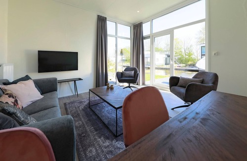 Hulshorst Ski Chalet | Modern chalet in a park near the Veluwemeer