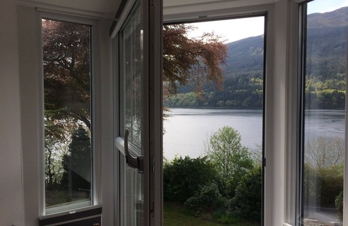 Arrochar Cottage | Modern Cottage, big garden, AGA, Loch/Mountain Views. Cinema Room & Log Burner