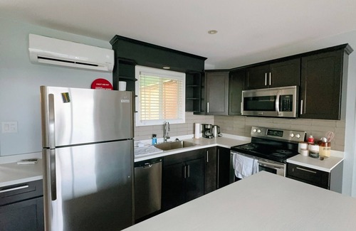 Moncton Villa | Modern Designer Villa Condo in Prime Location with Exclusive Amenities".