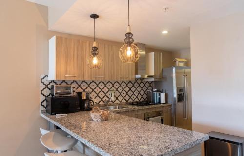 Shaba Apartment | Modern Ground Level Condo, 2 bedrooms, Direct pool access