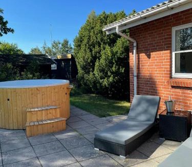 Grena Strand House | Modern Holiday Home With Spa At Grenaa Beach