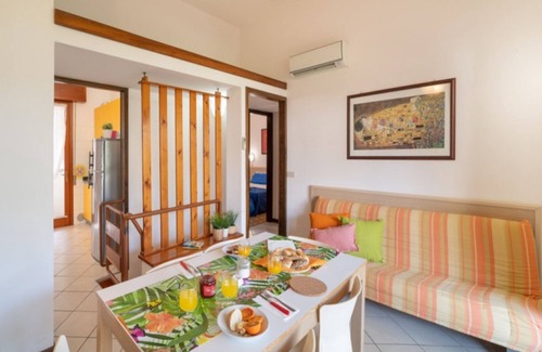 Bibione Lido dei Pini Apartment | Modern home with garden and pool