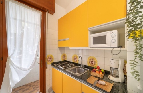 Bibione Lido dei Pini Apartment | Modern home with garden and pool