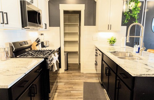 Weinland Park House | Modern Oasis in Columbus with Hot Tub on Roof with City Views