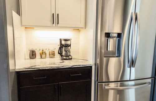 Weinland Park House | Modern Oasis in Columbus with Hot Tub on Roof with City Views