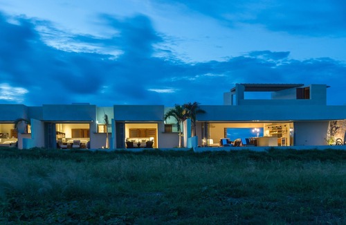 Micoud Villa | Modern Oceanfront Home with Pool, Outdoor Showers and Private Tennis Court