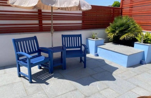 Exmouth House | Modern renovated air conditioned bungalow with sea views