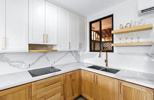 Coco Sunset Hills Apartment | Modern Split-Level 2-Bedroom Condo with Pools, Terrace & Easy Beach Access