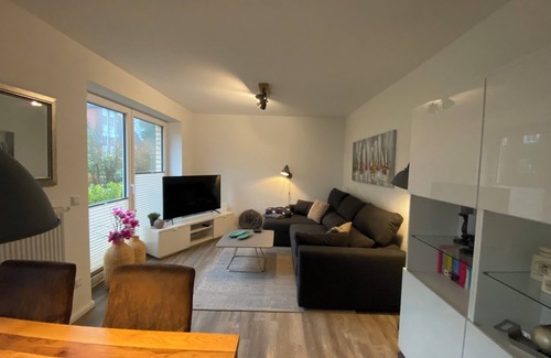 Timmendorfer Strand Apartment | Modern vacation apartment "Bikini Bottom" with garden. Dogs welcome!
