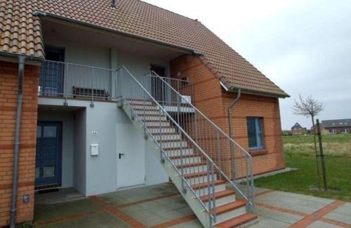 Friedrichskoog-Spitze Apartment | Moderne Ferienwohnung mit Balkon in Strandnähe