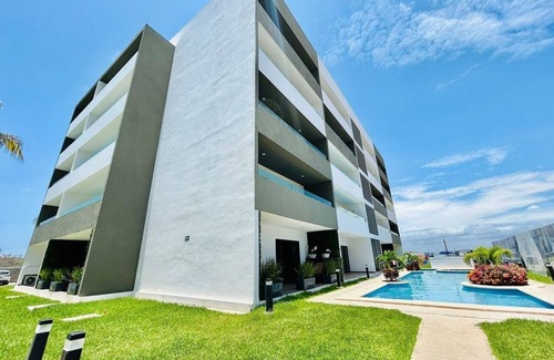 Villa Marina Condo | moderno con alberca cerca de la playa by Gpsrentas