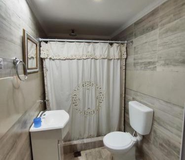 Yerba Buena Apartment | Mono Pringles YB Planta Baja Parking