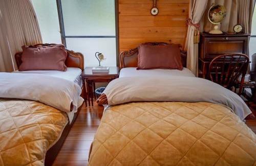 Oshima Apartment | MOTOMACHI BASE 少人数向け一棟貸し