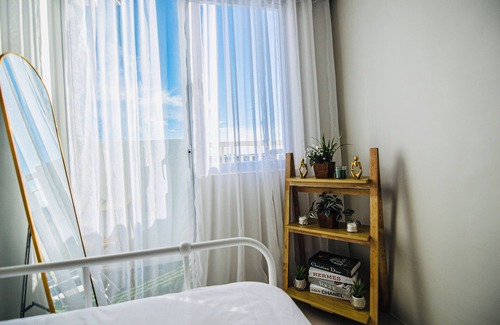 San Dionisio Condo | New 2BR w/Pool, fast Wifi, Netflix, Fitness area and near NAIA & SM