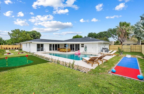 Villages of Palm Beach Lakes House | NEW 6BR Beach Resort-Style Game House! Heated Pool