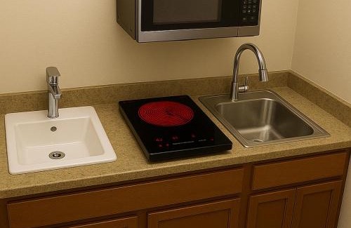 Wheatland Hotel | New Citrus Suites Extended Stay OKC Airport