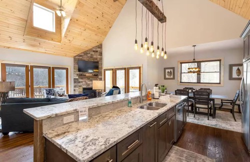 Vilas House | NEW Creekside 4-BR Modern Cabin with Hot Tub, Fire Pit, Grill, 2+ Acre field!