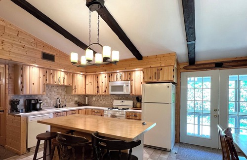Presque Isle Cabin | New! On water! Large Yard!