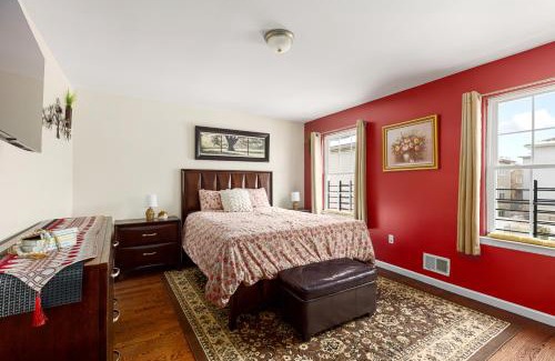 Newark House | Newark Gem 6BR, 5BA - Sleeps 24 - Walk to Prudential Center and Newark Penn Station, Near EWR and American Dream Mall, includes Parking - WiFi - Laundry - Backyard - Gym