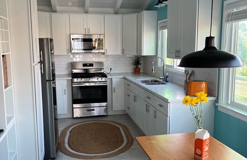 Peninsula Apartment | Newly remodeled beach cottage steps to the sand with Ocean view. New everything!