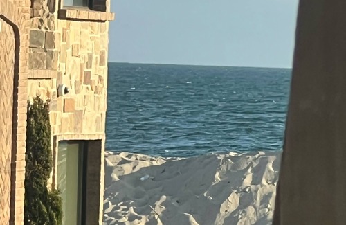 Peninsula Apartment | Newly remodeled beach cottage steps to the sand with Ocean view. New everything!