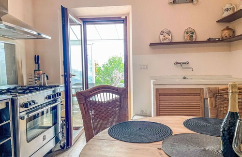 Cologna Spiaggia Villa | Nice apartment in villa with pool, hot tub, A/C, WIFI, TV, patio, pets allowed and panoramic view