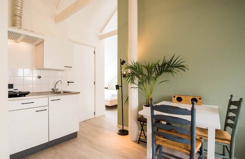 Nes Apartment | Nice studio for 2 people in the centre of Nes and the beach is 1.5 km away.