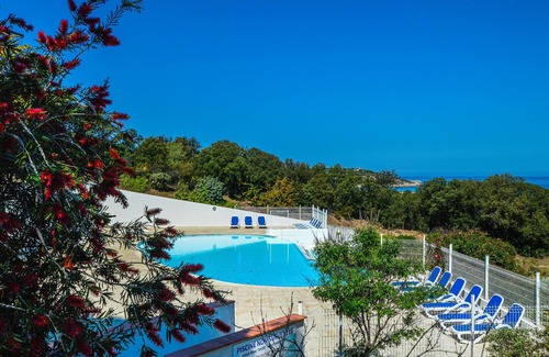 Lozari Apartment | Nice vacation apartment with terrace and pool in the north of Corsica.