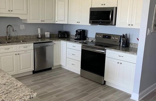 Avalon Condo | Nicely appointed two bedroom air conditioned Merrimack Condominium offering beachblock location,