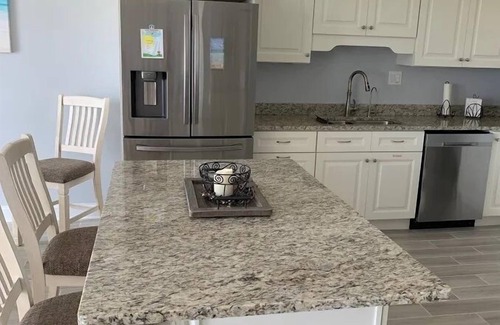 Avalon Condo | Nicely appointed two bedroom air conditioned Merrimack Condominium offering beachblock location,