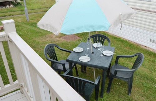 Bacton House | Norfolk Poppy Caravan - Sleeps 4 with Free WiFi and SKY TV.