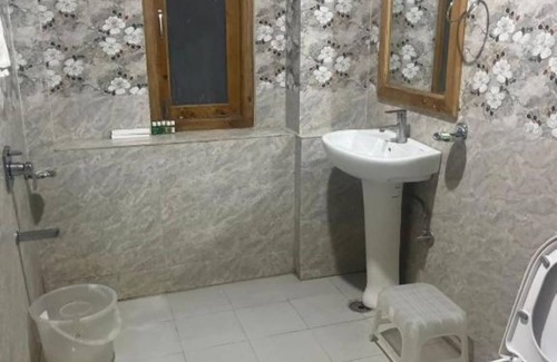 Cheog Hotel | Norvin Homes- Family Room/breakfast included