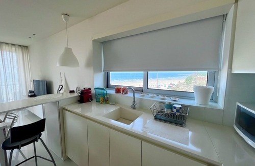 Ofir Apartment | Ocean facing cozy spot. A painting-like stay, brimming with light and fresh air.