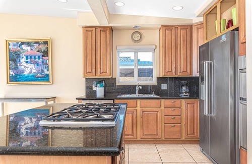 Balboa Peninsula Condo | Oceanfront 5BR Home with Spacious Balcony & Patio, Right on the Boardwalk!