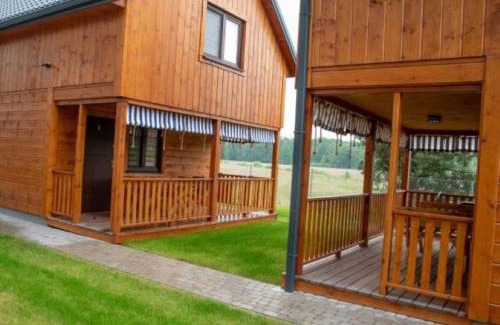Włodawa Resort | OLIWIER domki letniskowe Okuninka