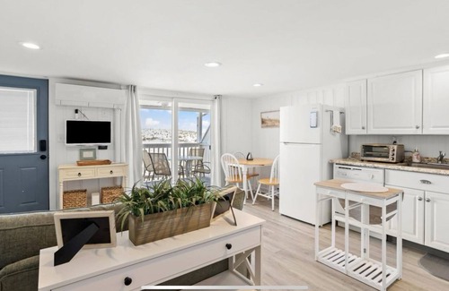 Hampton Condo | On the Beach-Dog Friendly 2BR Condo walk to the waves.