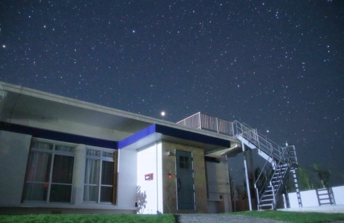 Bora House | One-story house with a view of the ocean on the remote island of Miyakojima with free rental car available before check-in and after check-out.